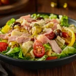 A vibrant 1905 Salad with ham, cheese, and Spanish olives