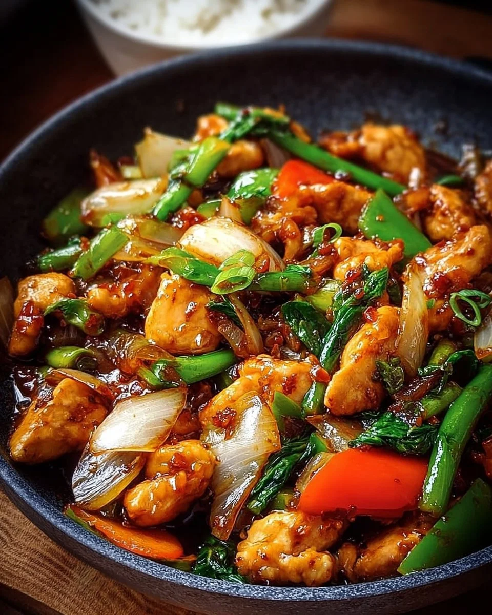 Bariatric Tips Tricks & Recipes 2025 | Facebook 2 Golden Soy-Garlic Chicken Stir-Fry with fresh spring vegetables in a vibrant dish