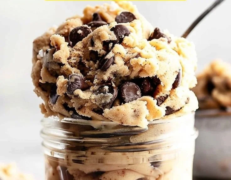 Delicious edible cookie dough in a bowl ready to enjoy.