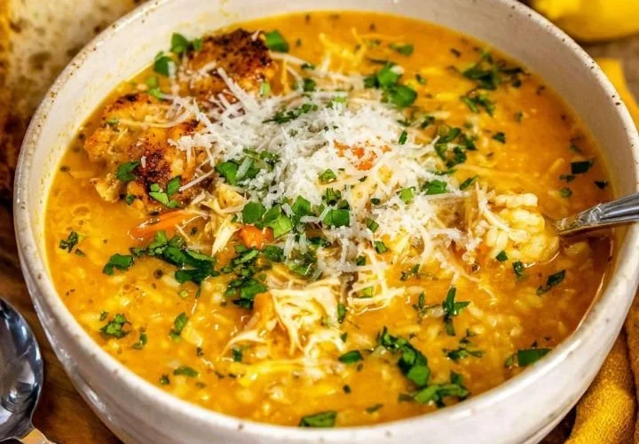 A bowl of Italian Penicillin Soup filled with fresh herbs and vegetables