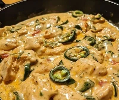 Creamy Jalapeño Chicken Skillet served in a rustic dish