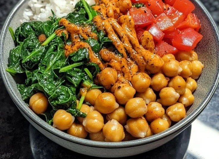Healthy spinach chickpea dinner bowl with fresh ingredients